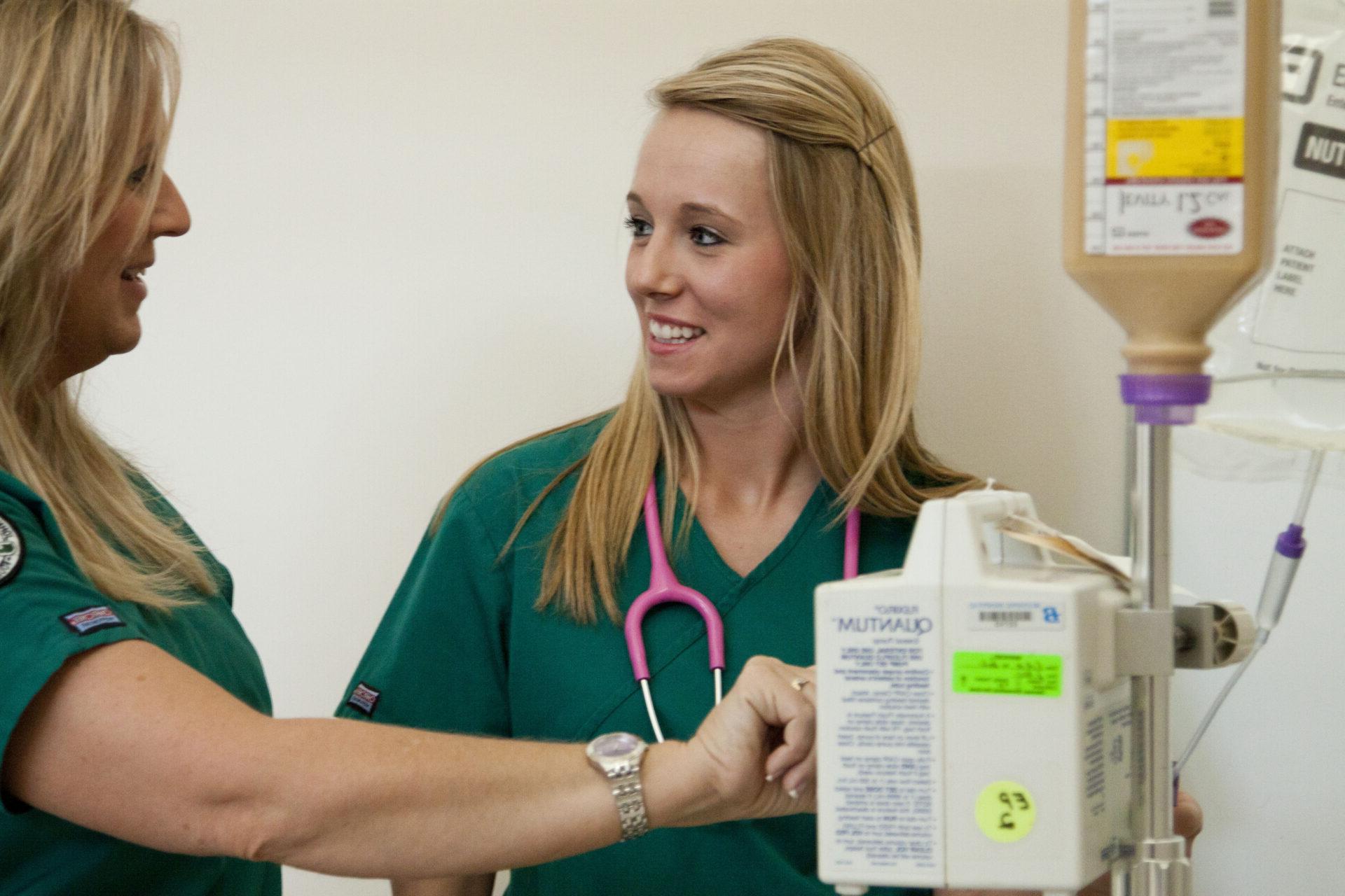 Two healthcare workers on the job